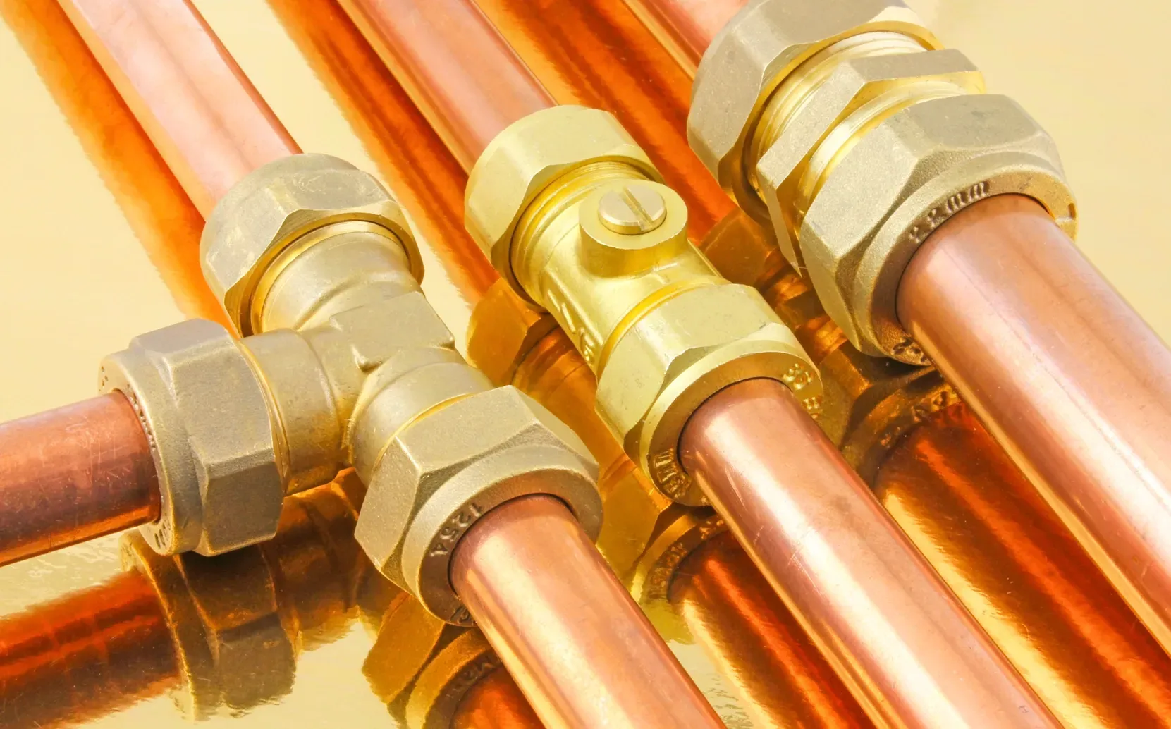 Copper pipes and fittings used for professional residential copper repiping and plumbing installation.