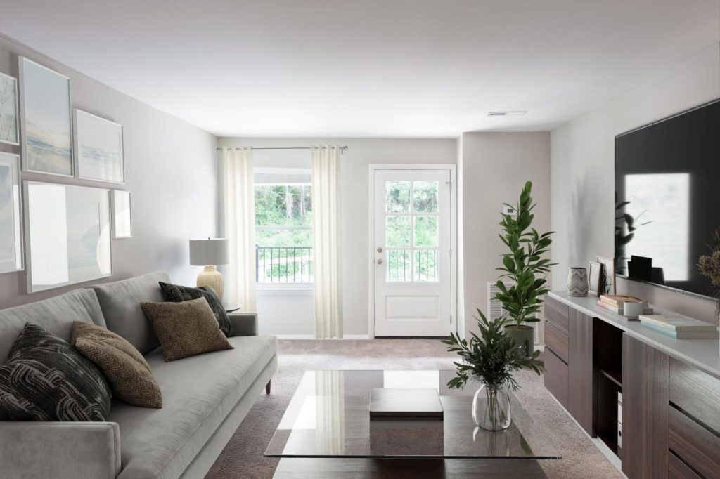 A living room with a couch and a coffee table.