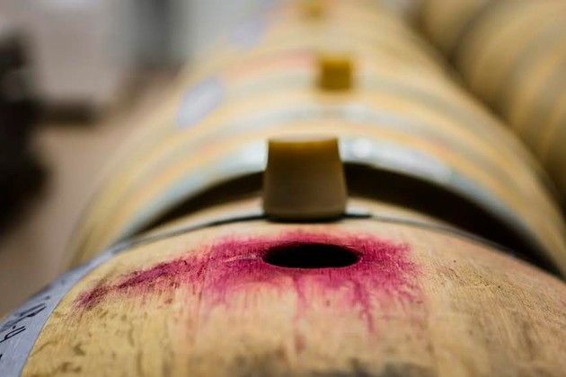 A close-up of a wine barrel.