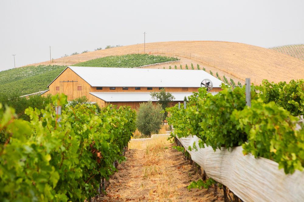 Parrish Family Vineyard in Paso Robles, California with vineyards and its ranch house tasting room and winery. 
