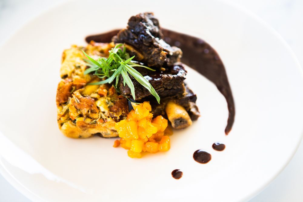 Gourmet plated dish made by the Parrish Estate Chef, served alongside a wine tasting experience.