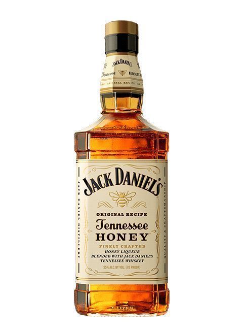 Botella de whisky Jack Daniel's Tennessee Honey con líquido ámbar y etiqueta color crema sobre fondo blanco.