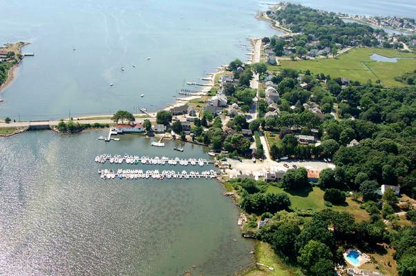 An aerial view of a body of water surrounded by trees