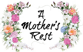 A mother 's rest sign with a floral wreath around it.
