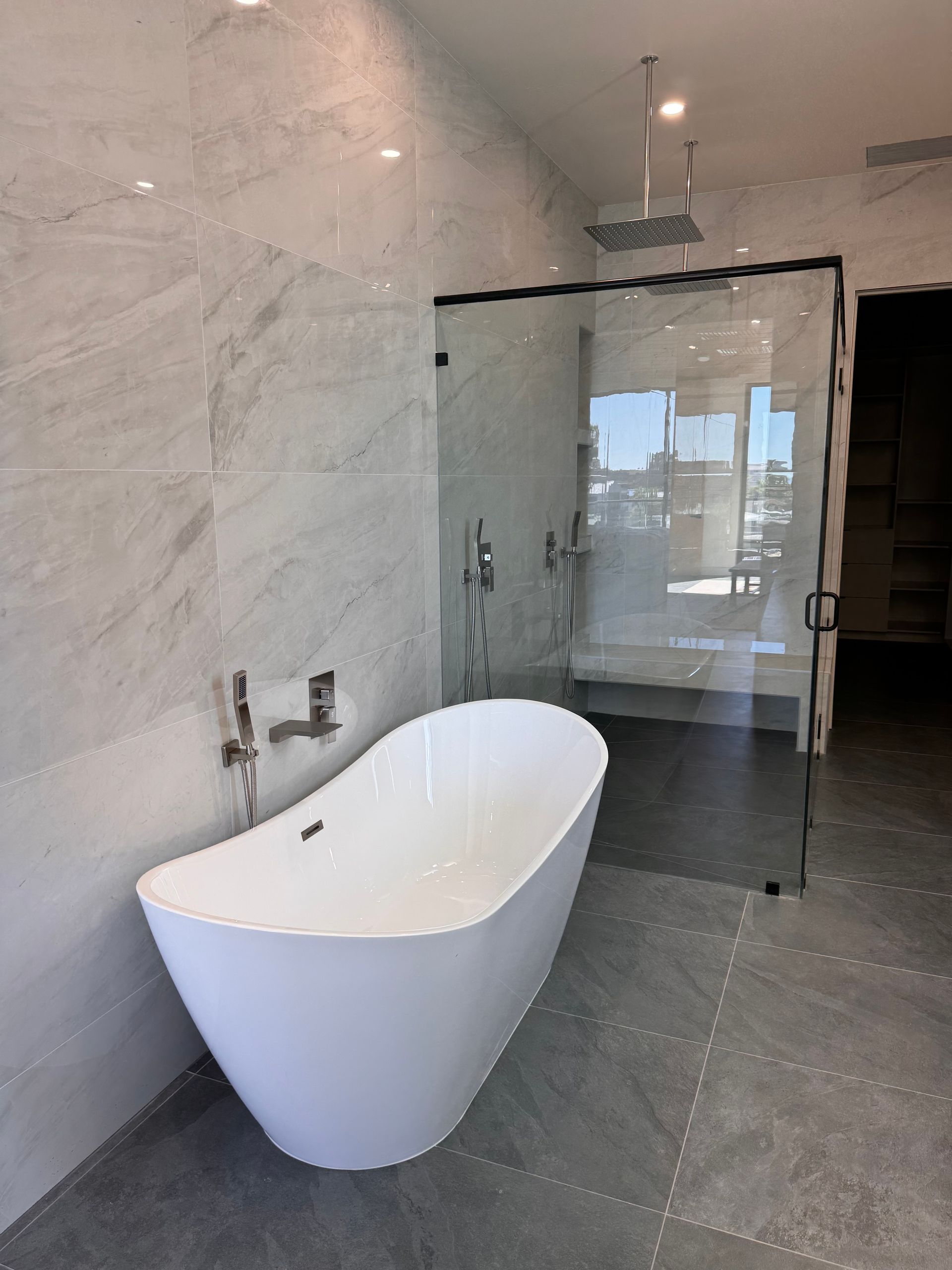 Contemporary bathroom remodel with tile finishes in Escondido