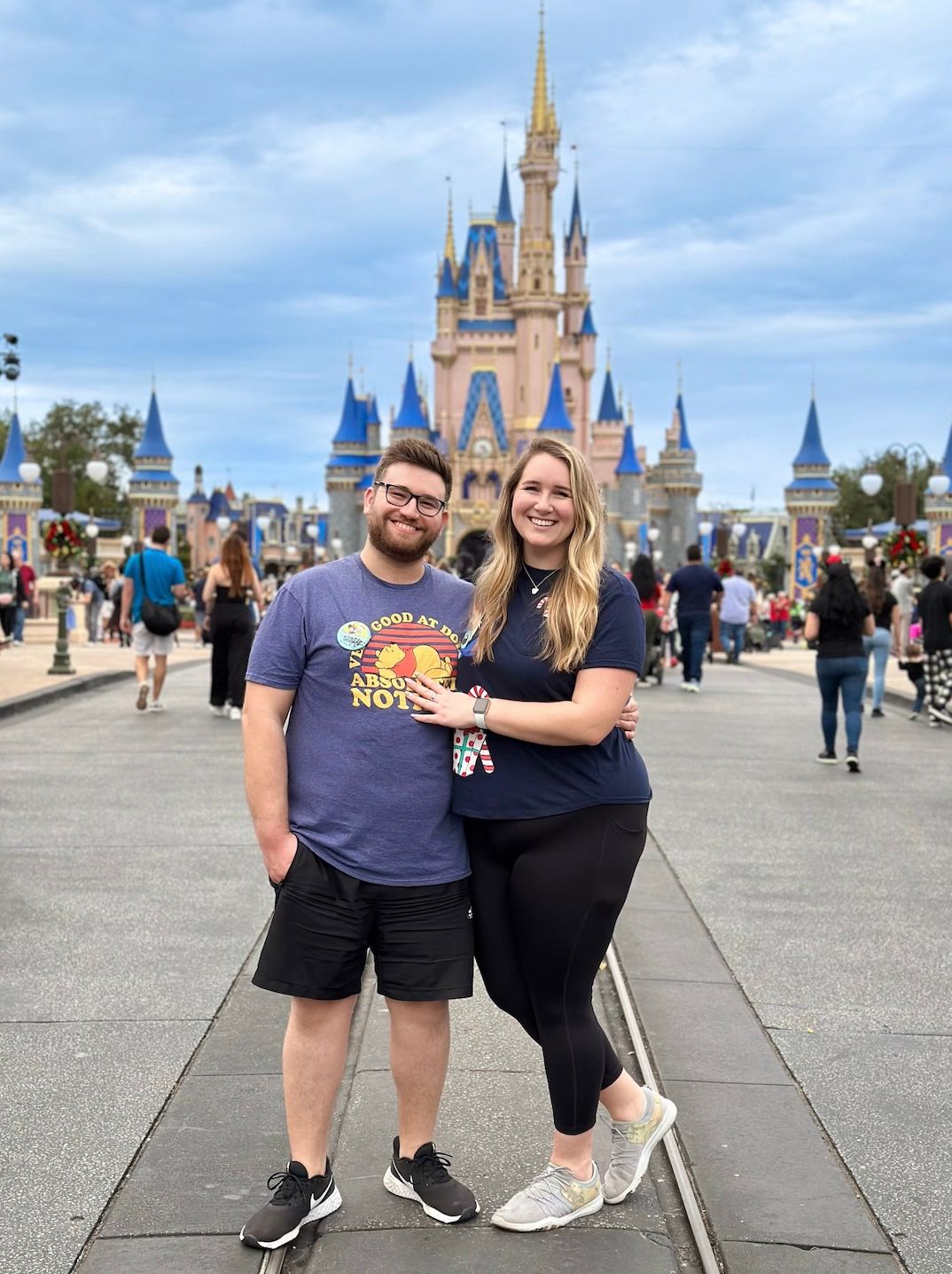 scott & lil standing in front of cinderellas castle at magic kingdom in walt disney world