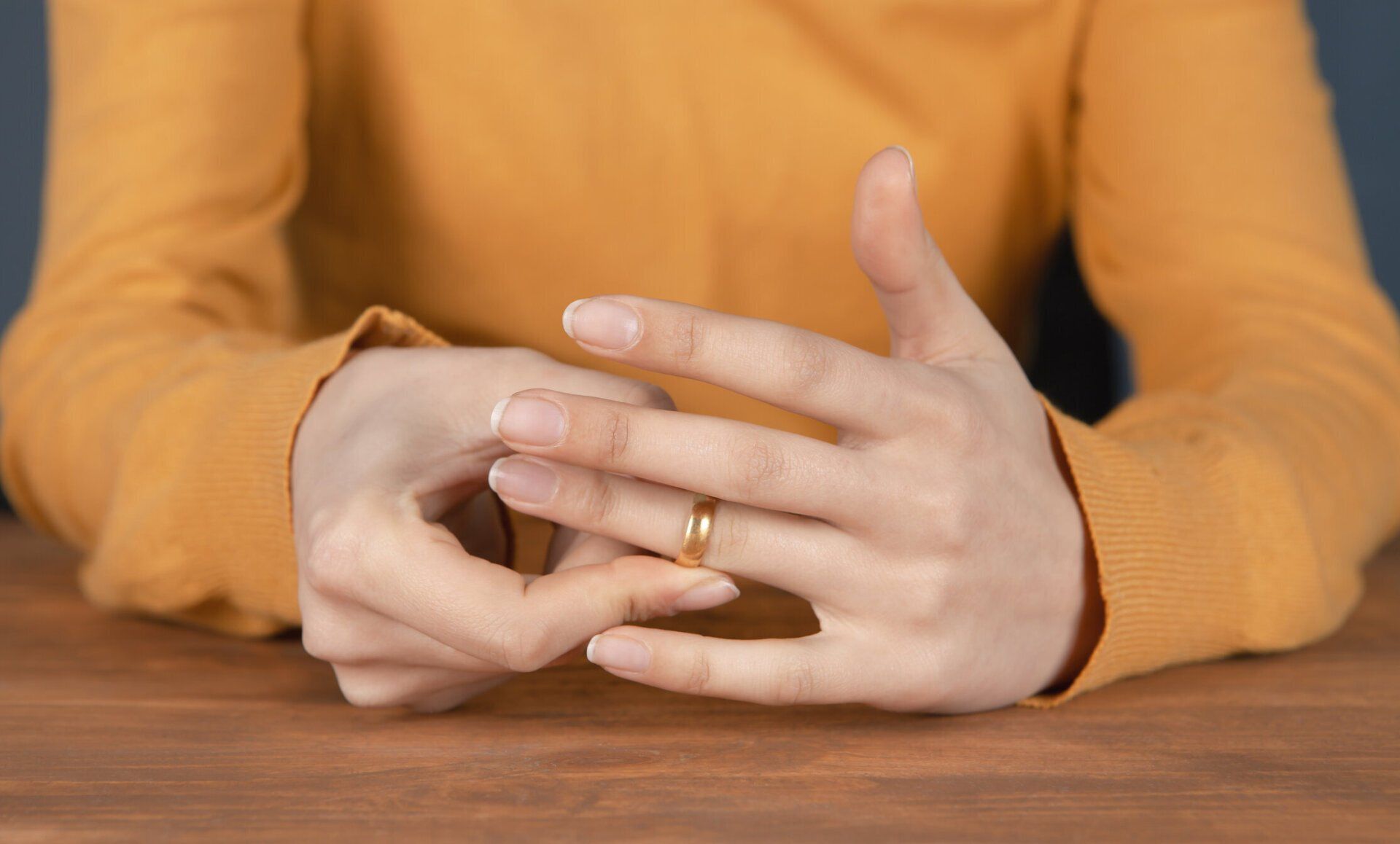 Person Removing Her Wedding Ring - Duncan, OK - The Kanehl Law Firm P.L.L.C. Person Removing Her Wedding Ring - Duncan, OK - The Kanehl Law Firm P.L.L.C.