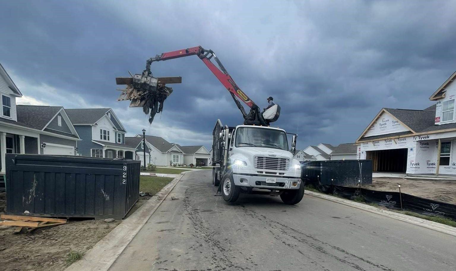 Pick & Haul Truck Cleaning Debris — Myrtle Beach, SC — Pick & Haul Services