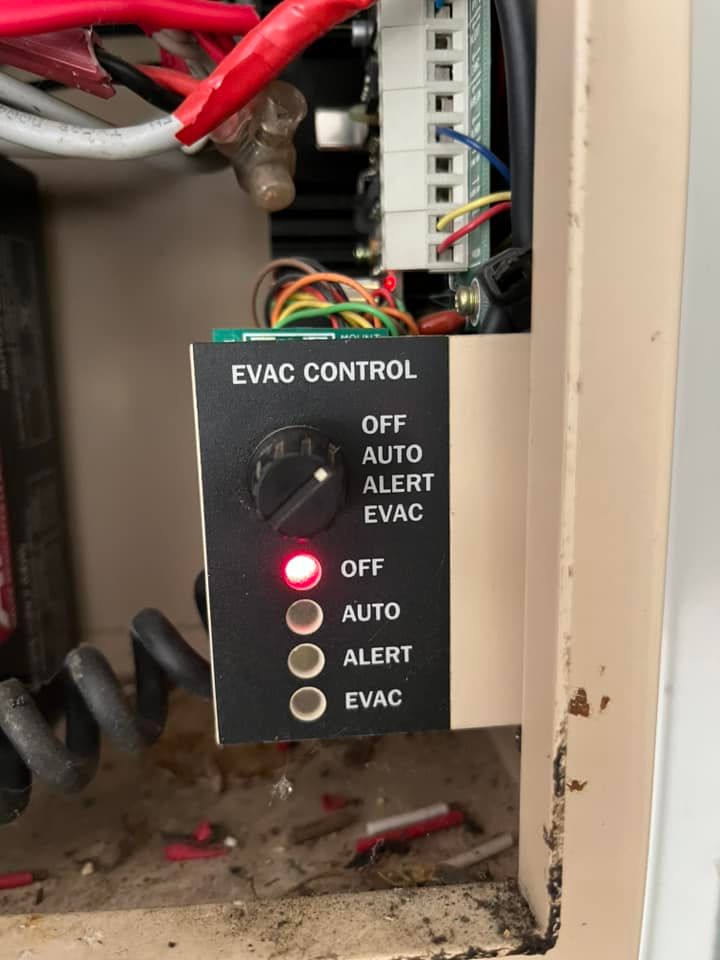 Evac Control Panel With Red Status Light in an Equipment Cabinet — CSET Group Fire & Security in Sydney, NSW