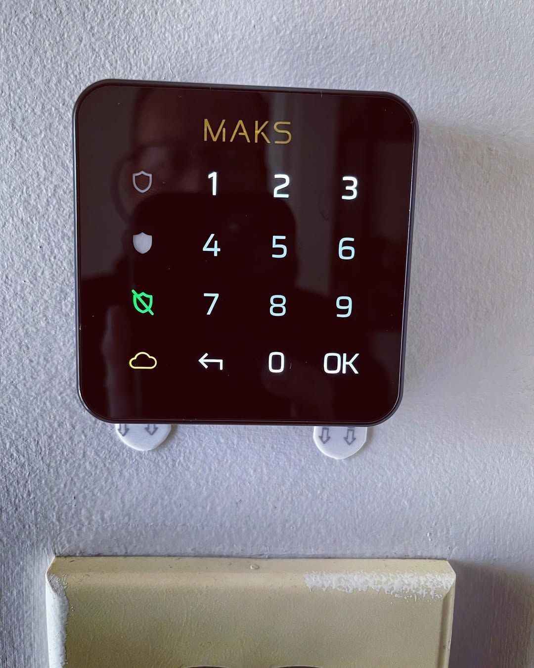 Wall-mounted Black Keypad With White Numbers and Colored Icons — CSET Group Fire & Security in Sydney, NSW