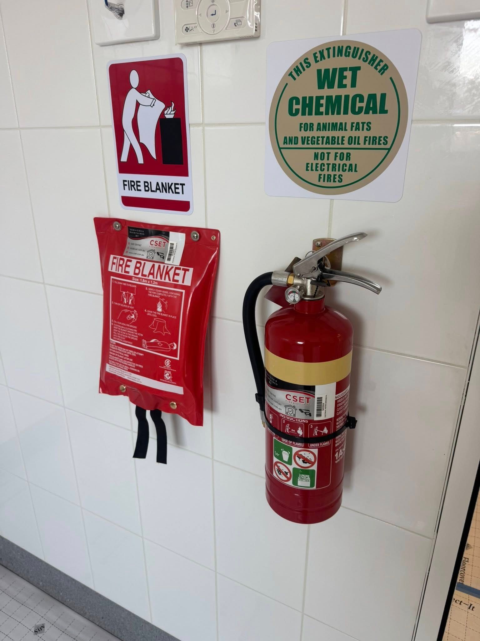 Wall-mounted Fire Extinguisher, Chemical Safety Sign, and Red Fire Equipment — CSET Group Fire & Security in Sydney, NSW
