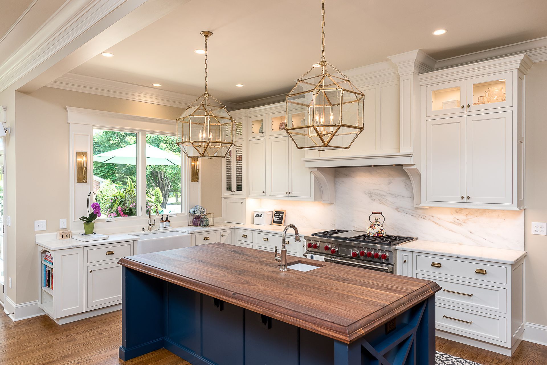 There is a large island in the middle of the kitchen.