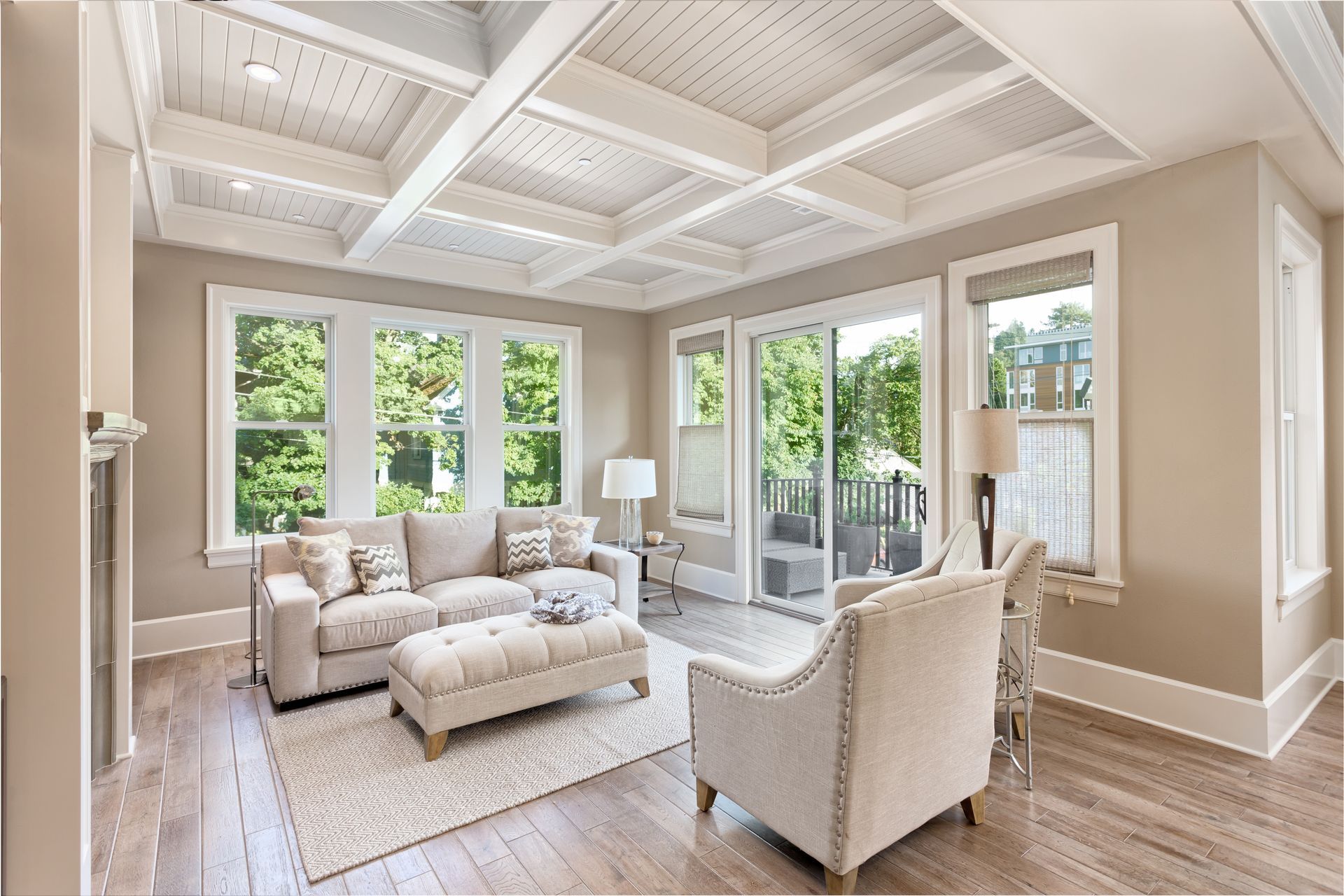 New home addition with a seating area filled with furniture. 