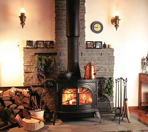 Black cast iron gas stove in a living room
