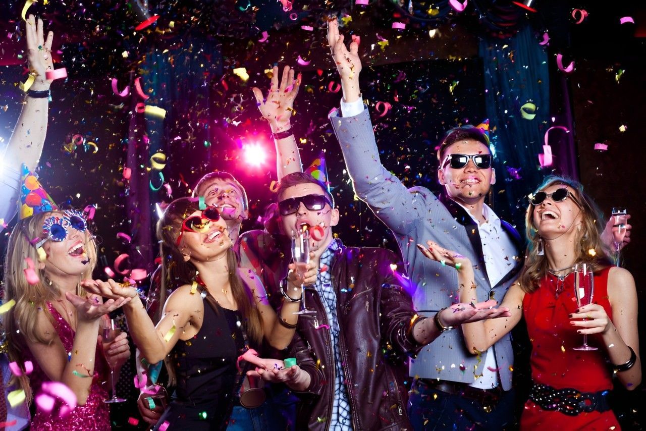 A Group Of People Are Having A Party And Throwing Confetti In The Air — HYP-E-VENTS In Spence, ACT