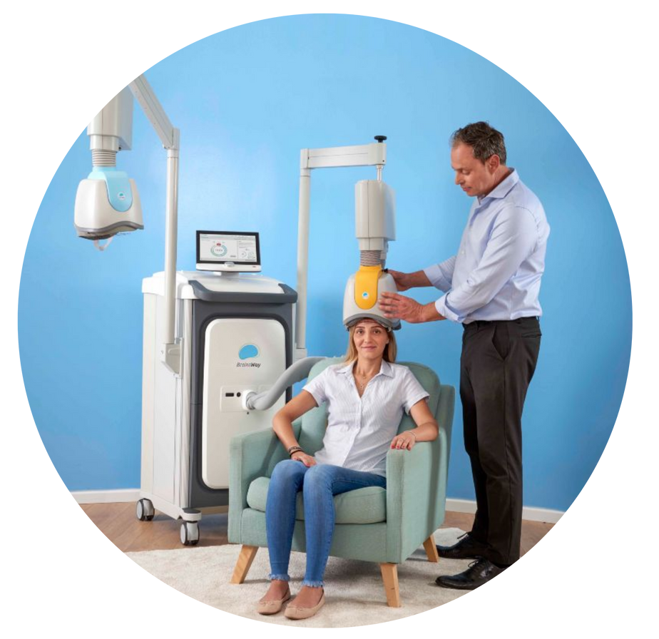 Clinic scene with a patient in a chair and a dentist adjusting an overhead dental device.