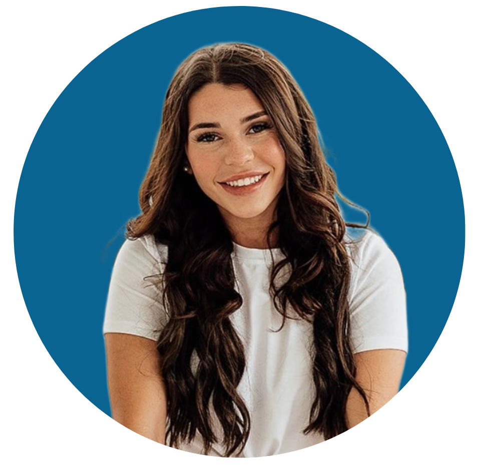 Portrait of a smiling woman with long dark hair in a white shirt on a blue background