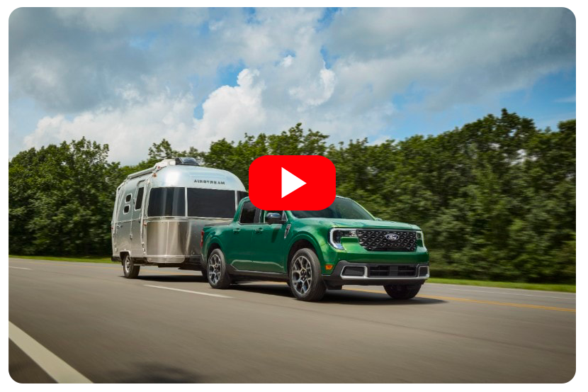 Ford video with green truck pulling trailer