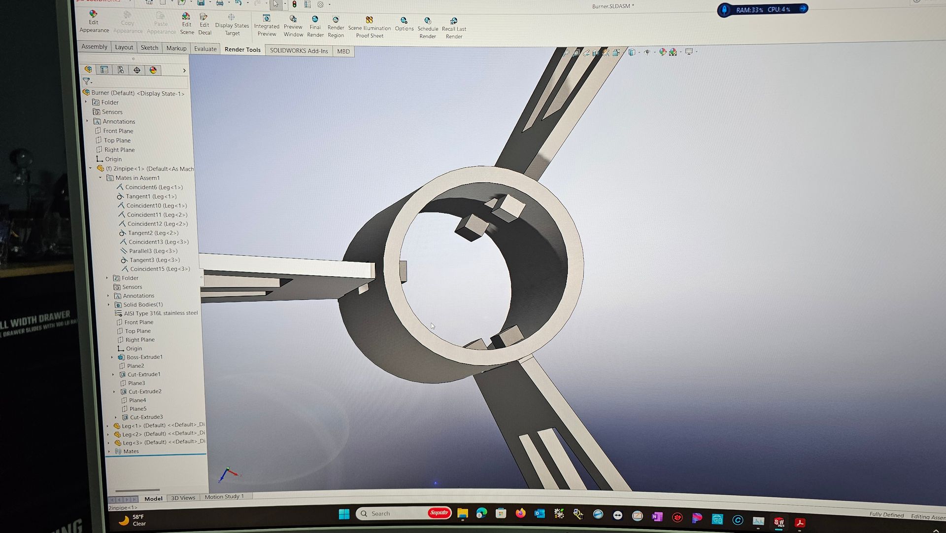 CAD software showing a 3D model of a circular mechanical part with three arms on a computer screen