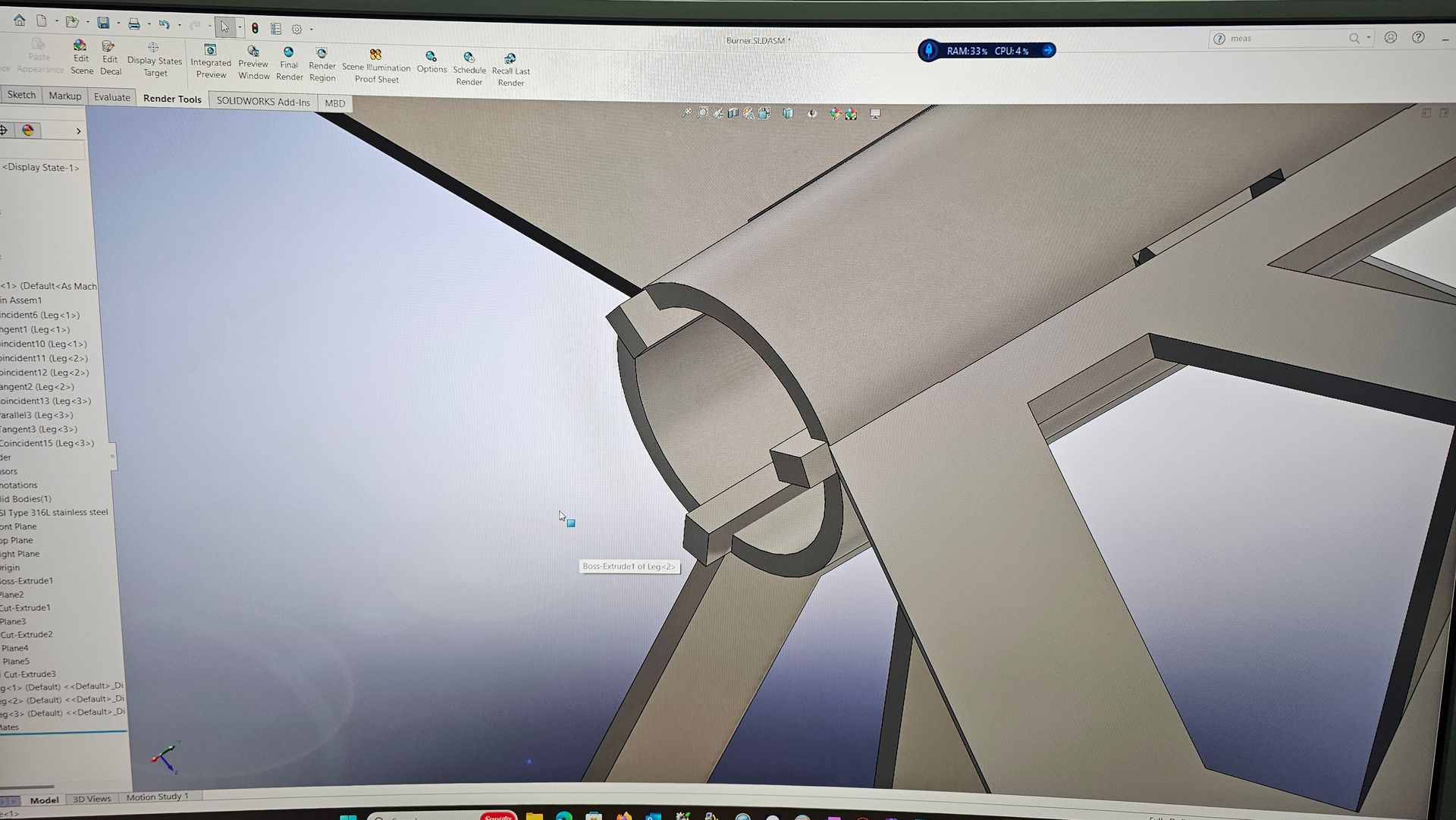 Close-up of a CAD model showing a light gray mechanical hub with multiple angled blades or arms.