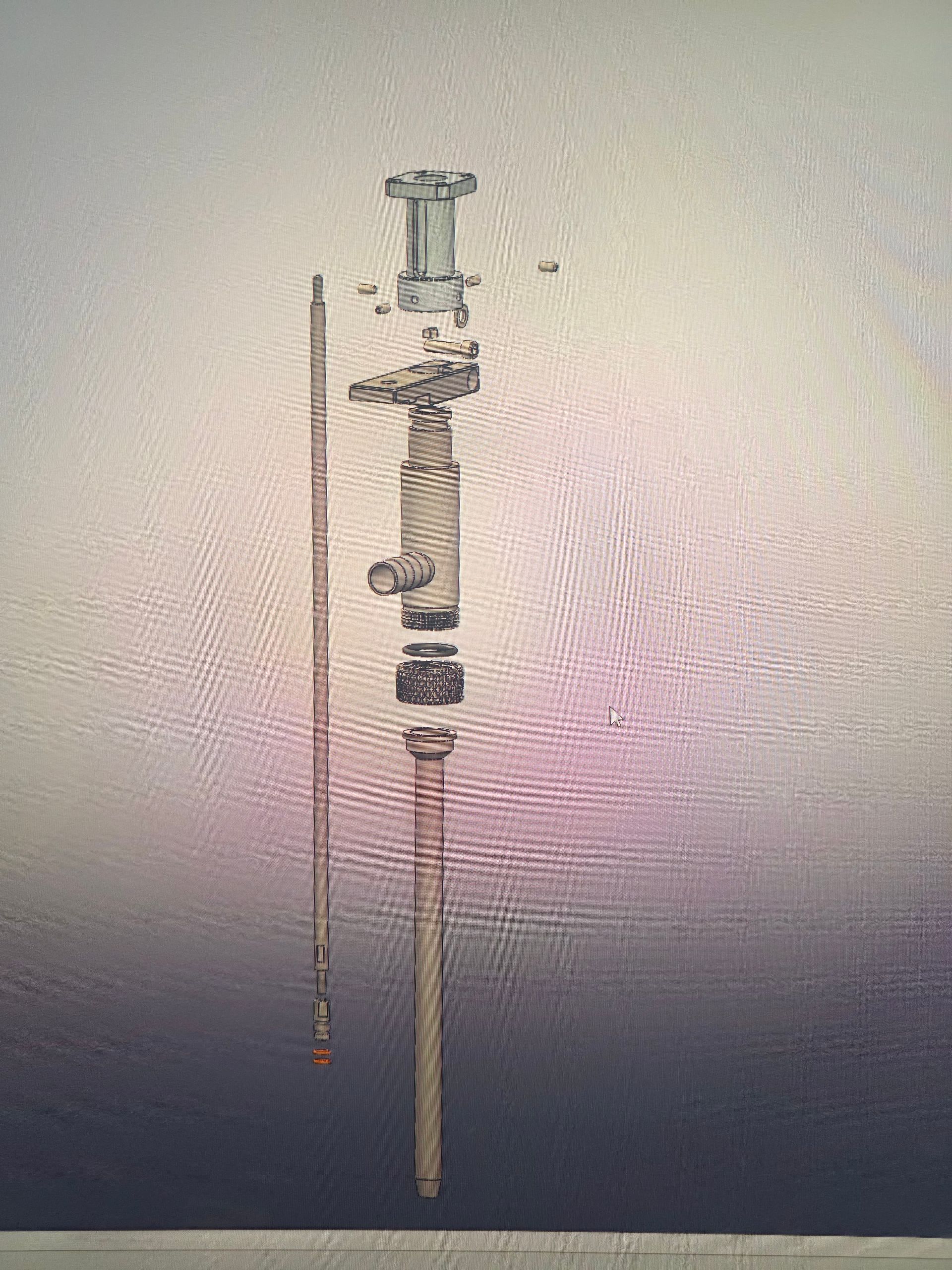 Exploded view of a metallic tool or pen-like device with separate components arranged vertically on a light background
