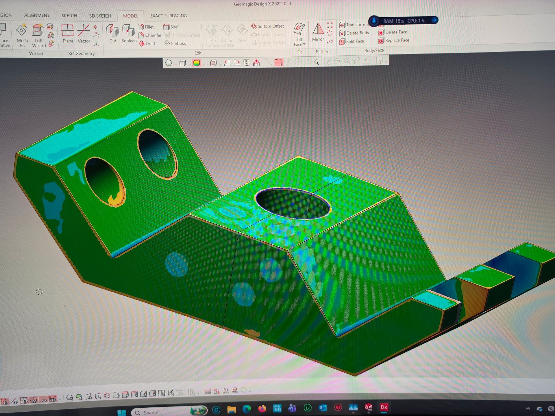 3D CAD model of a green mechanical bracket with holes displayed in a design software window