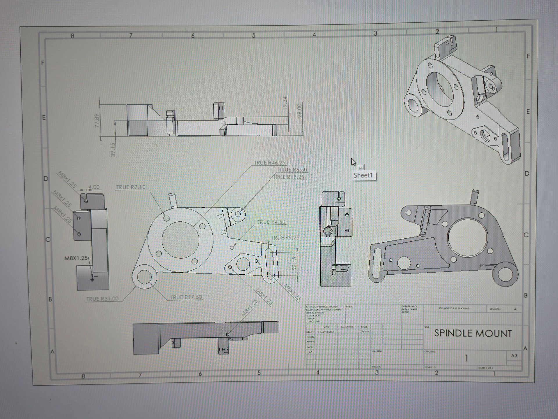 Technical engineering blueprint with multiple orthographic views and dimensions of a mechanical bracket.