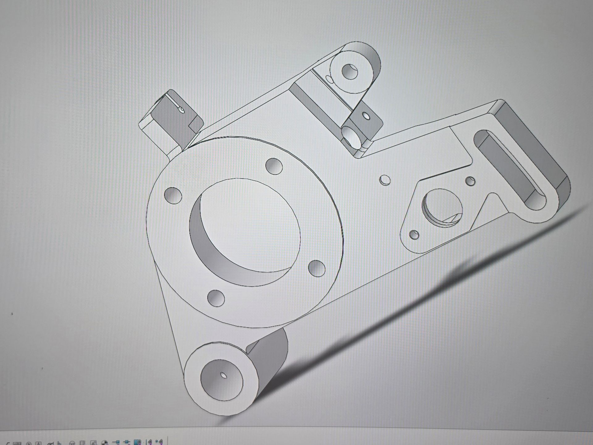 Technical drawing of a mechanical part with a large central hole and several mounting holes on white background