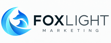 Foxlight Marketing logo with blue swirl icon and black text on white background