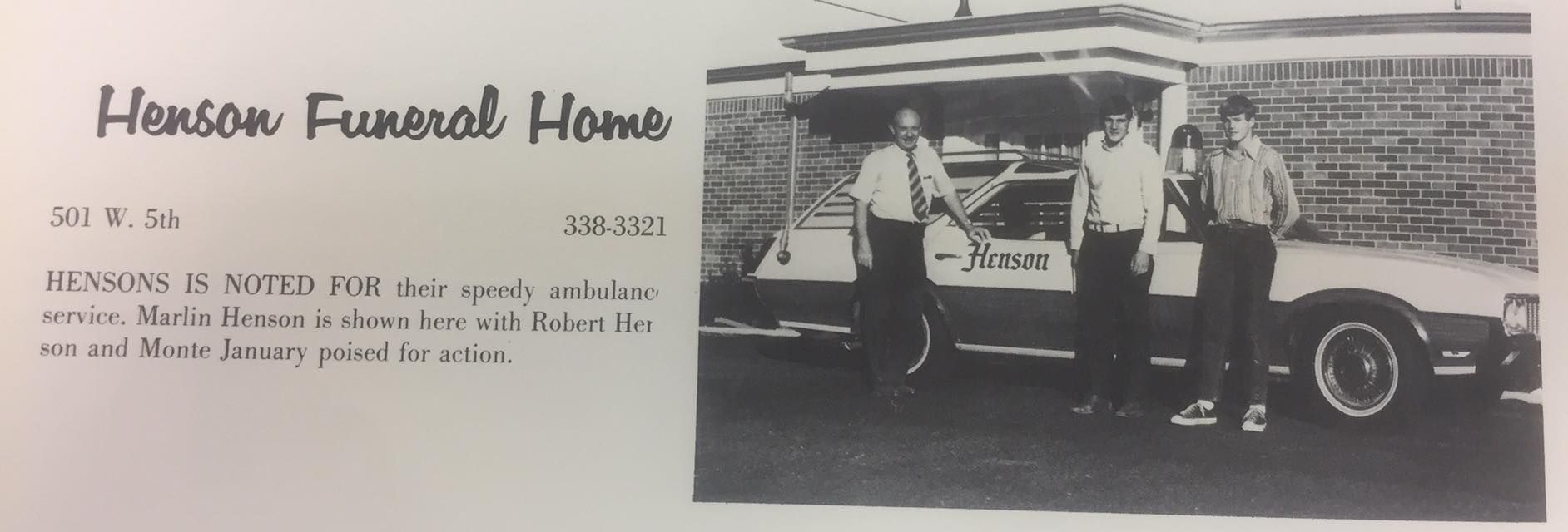 Vintage black-and-white photo of three people beside a car with a handwritten caption on the left.