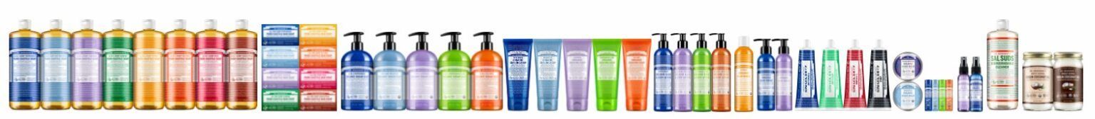 Bottles of beauty products. Pump and squeeze bottles of various colors in a row.