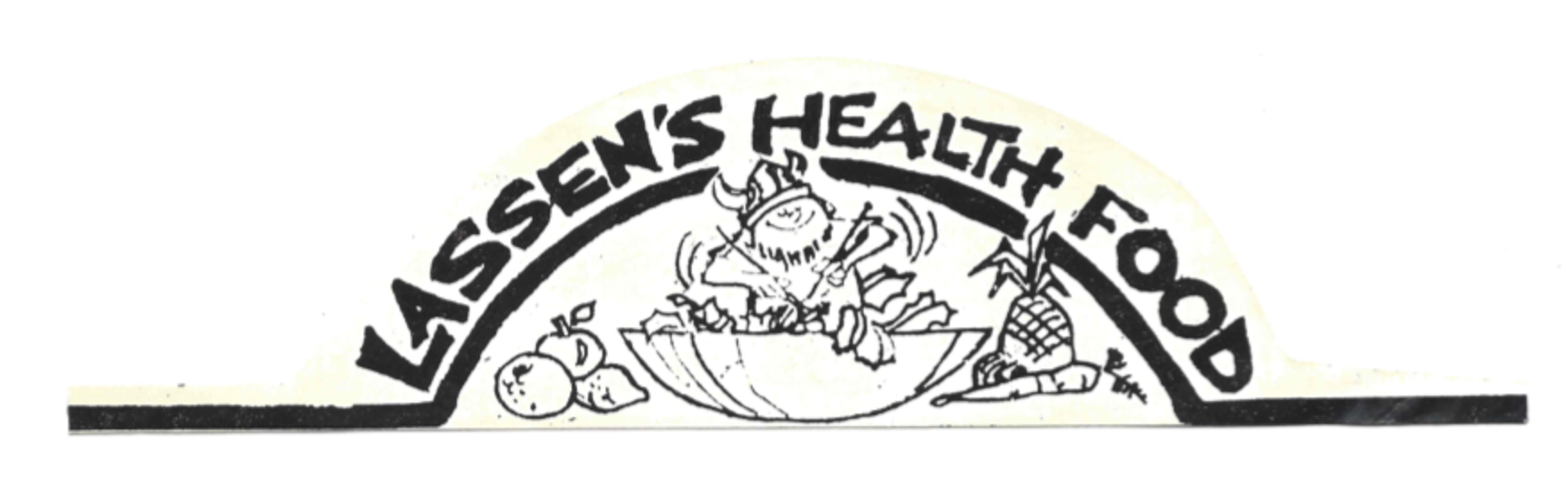 Logo for Lassen's Health Food, with text and cartoon figures of fruits and vegetables.