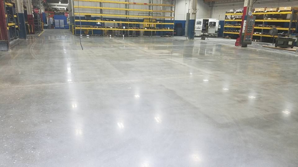 After polished concrete installed on warehouse floor 