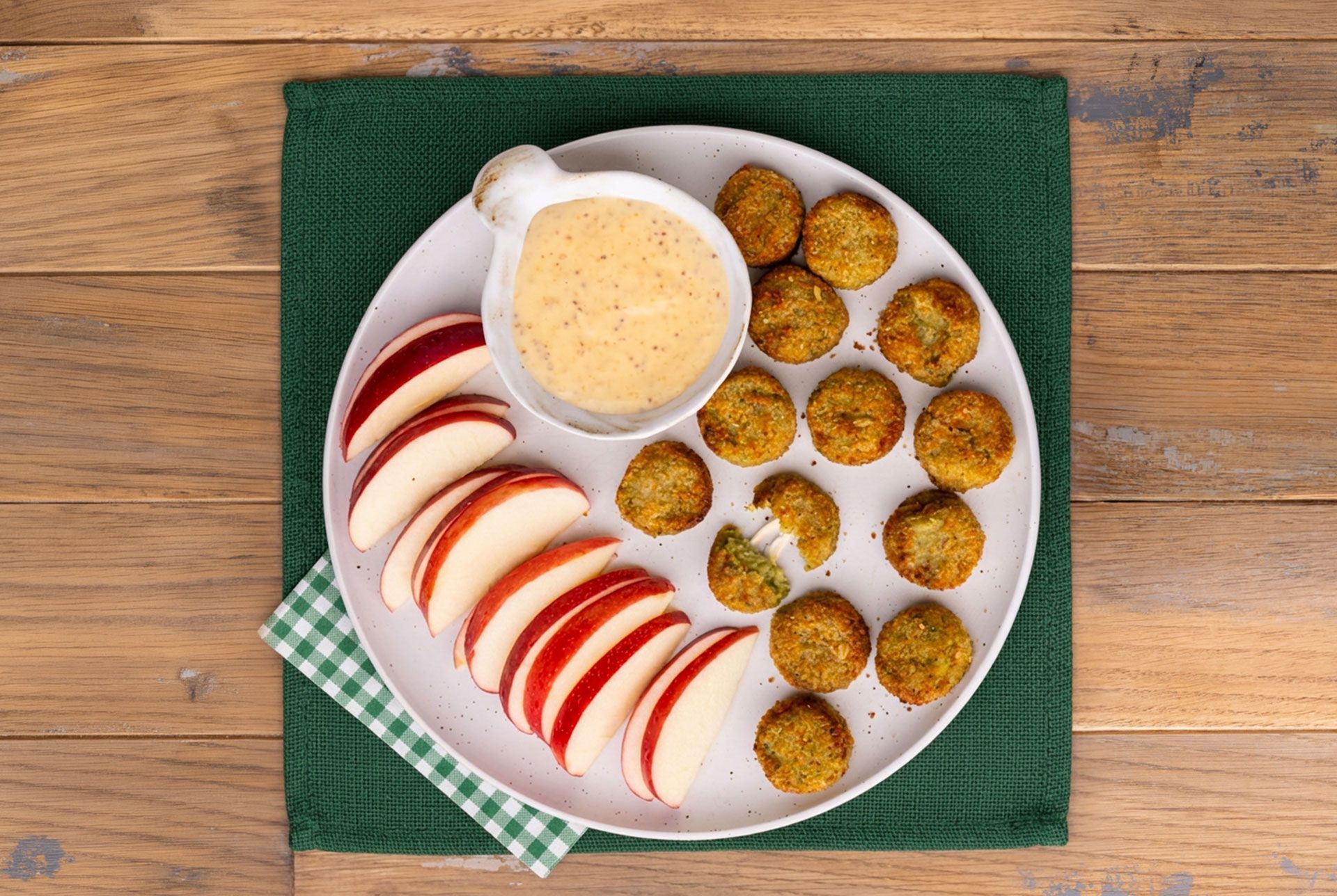 After-school snack plate with honey mustard dip made with Dr. Praeger's Broccoli Cheddar Cheesy Bites