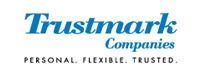 Trustmark Companies logo with blue text on a white background: "Trustmark Companies" above "PERSONAL. FLEXIBLE. TRUSTED."