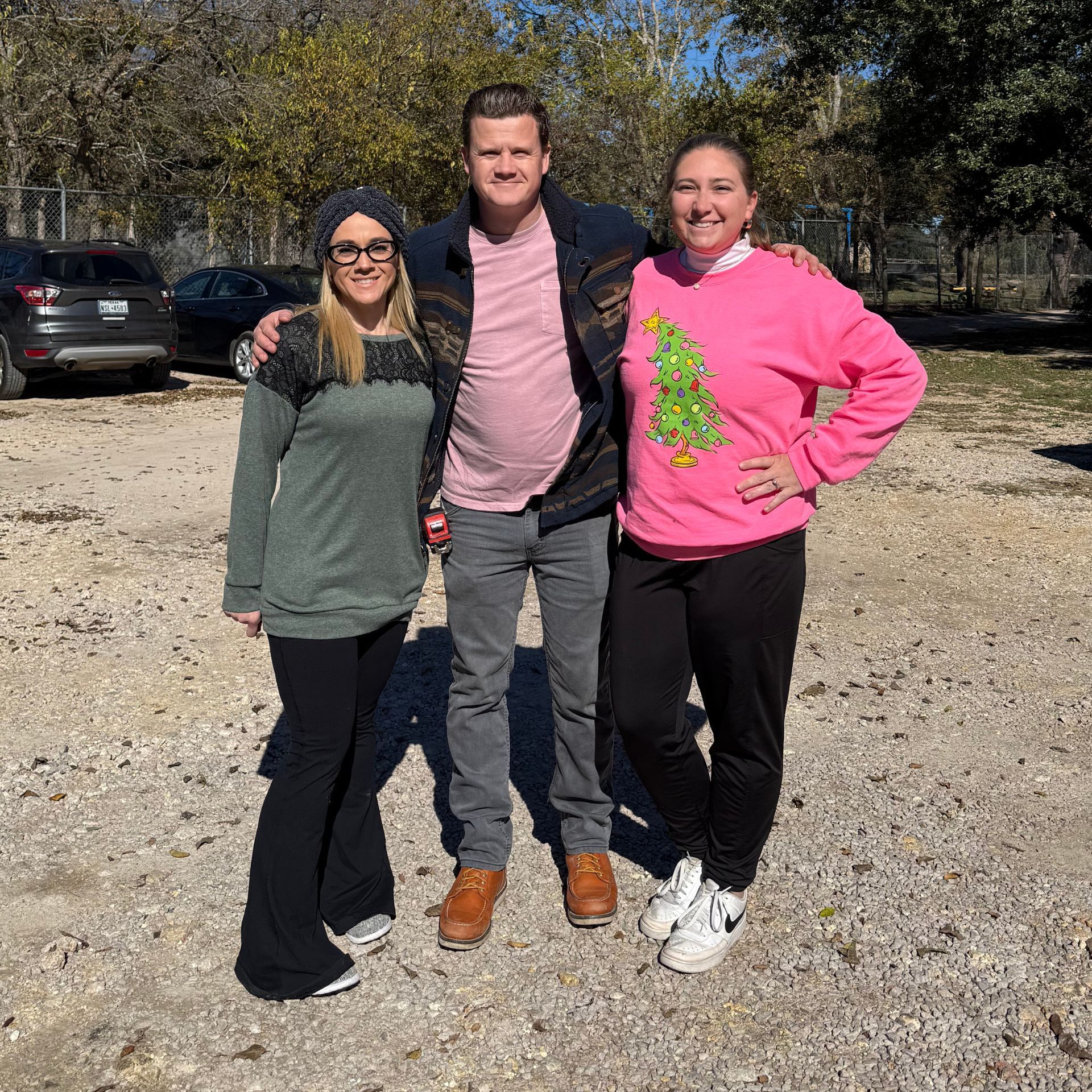 Group of volunteers smiling while working on a home improvement project at Hope House, a nonprofit in Texas