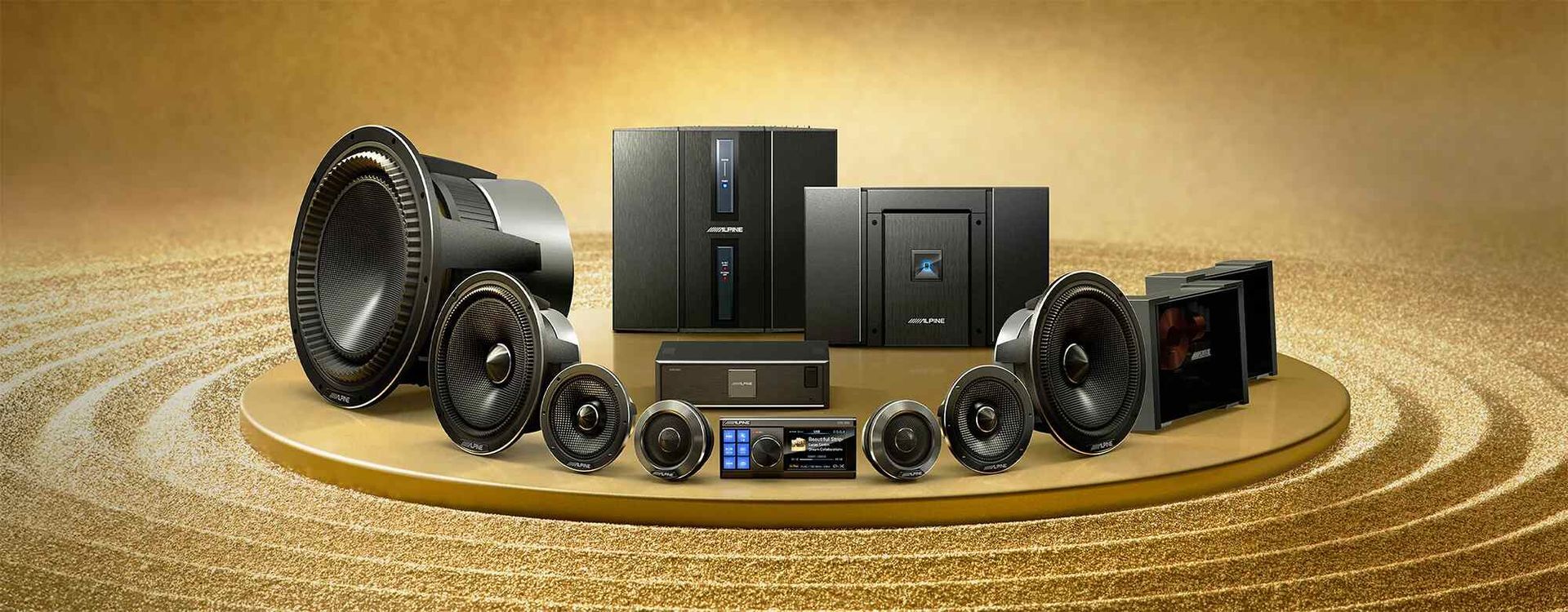 A Group of Speakers Are Sitting on Top of a Gold Surface — Smart Automotive Technologies in Noosaville, QLD 