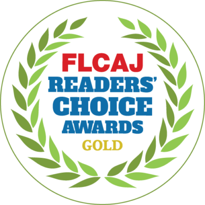 FLCAJ Readers' Choice Awards Gold seal, green laurel wreath, red and blue text.