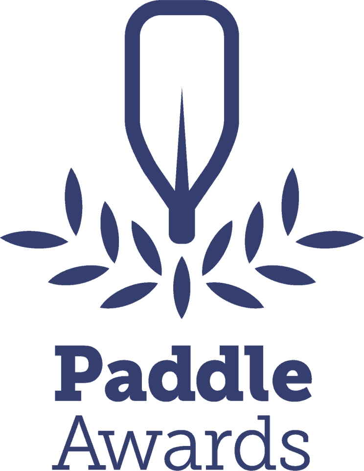 Blue logo of a paddle above a wreath, with the words
