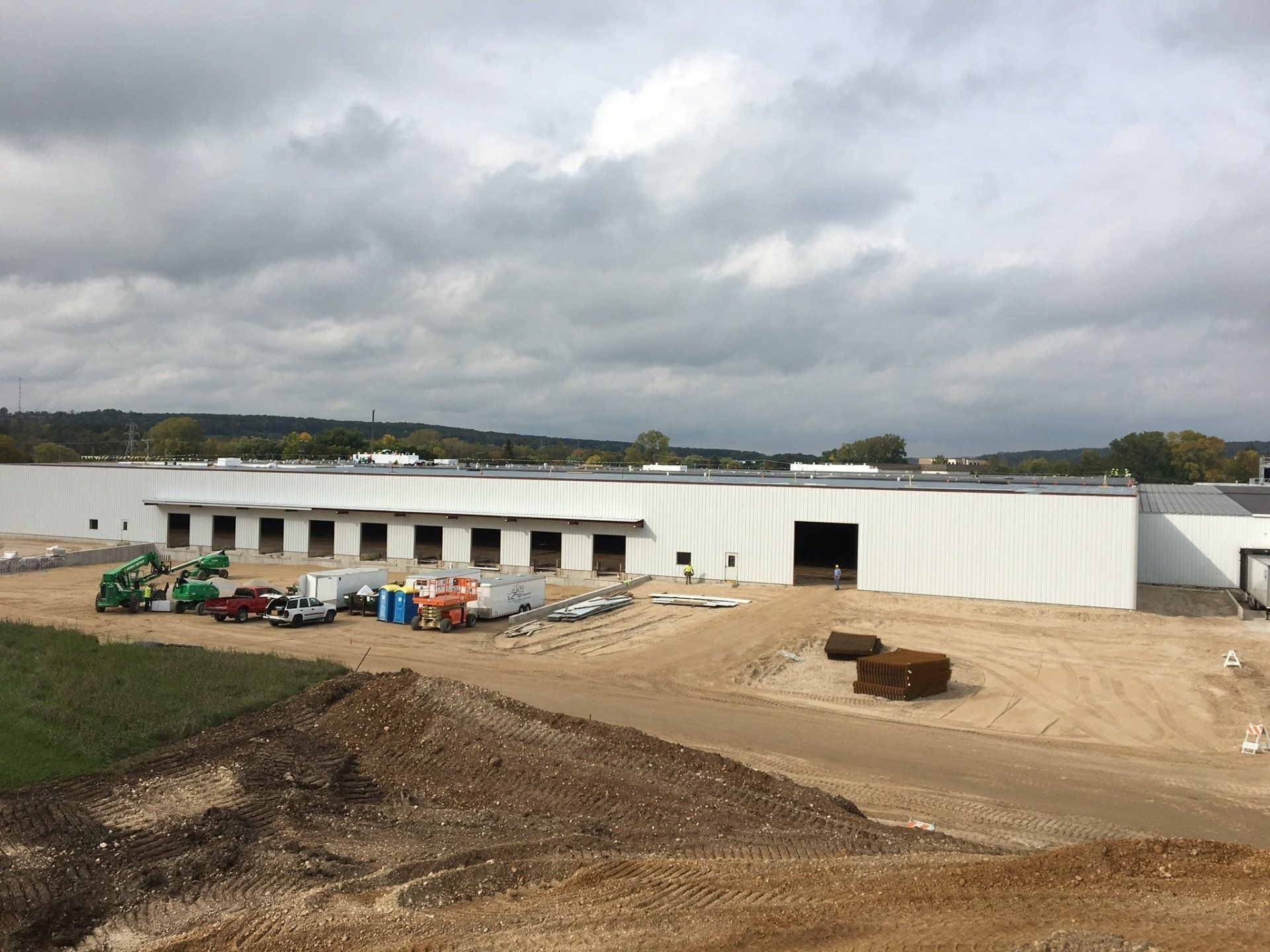 A Large Wooden Structure Is Being Built in The Middle of A Dirt Field | Sheboygan, WI | Elite Builds