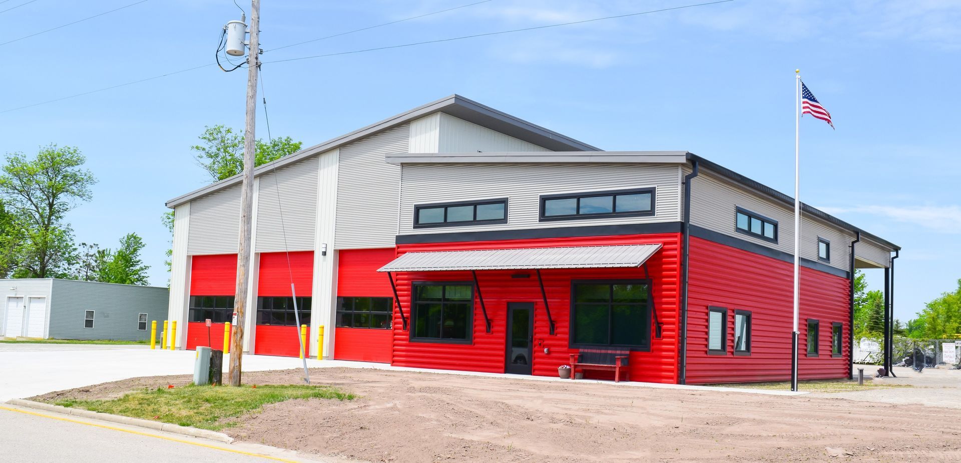 A Large Building with A Clock Tower in The Middle of It | Sheboygan, WI | Elite Builds