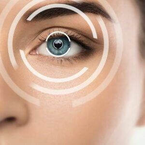 A close up of a woman 's eye with a circle around it.