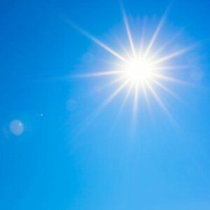 The sun in the sky on a cloudless day