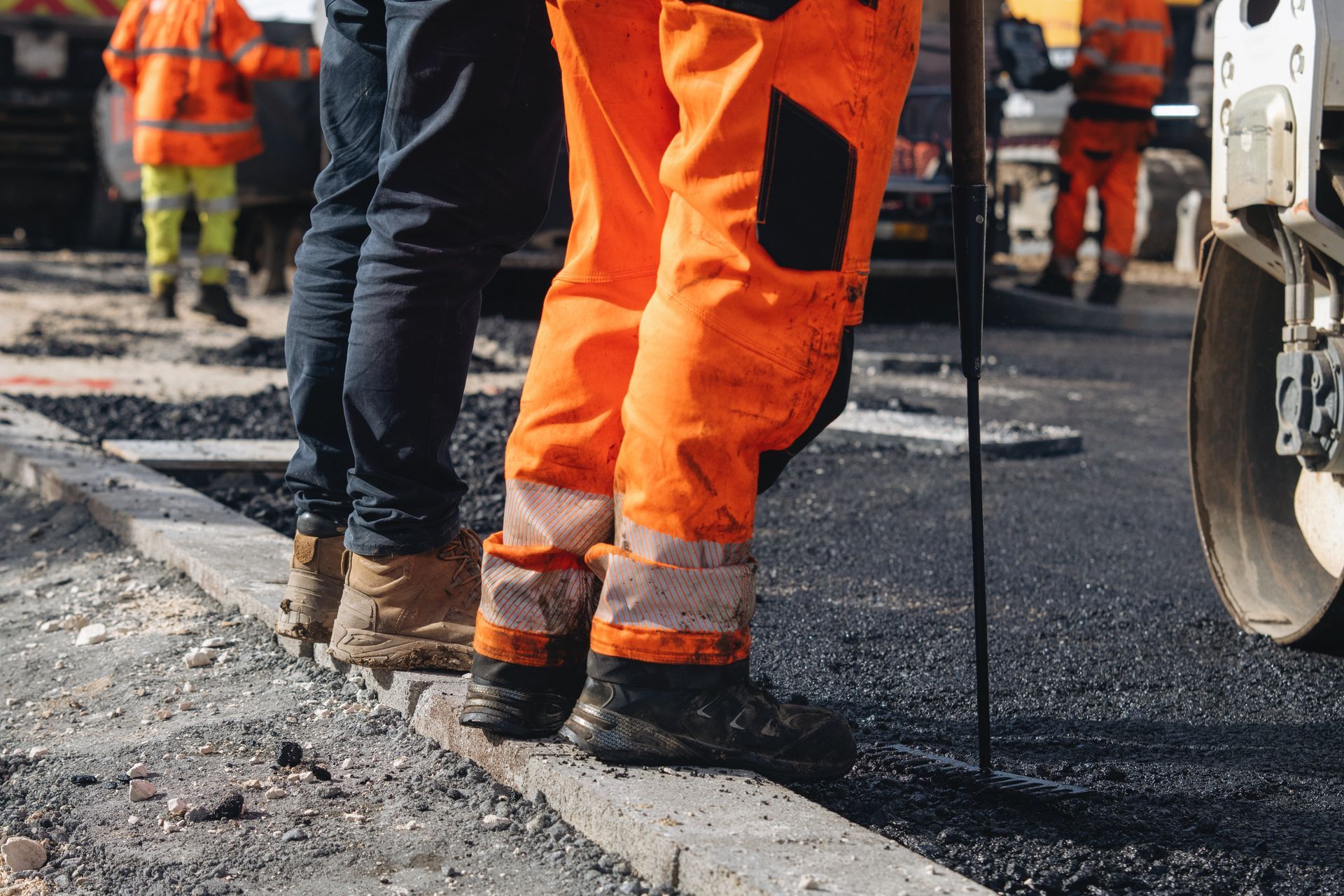 Asphalt paving contractors from Pave Patrol at work on a Princeton, NJ driveway Asphalt paving contractors from Pave Patrol at work on a Princeton, NJ driveway