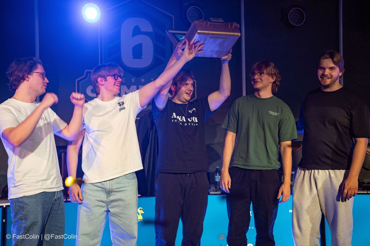 Winning team lifting the trophy at R6 Central Combine 2026