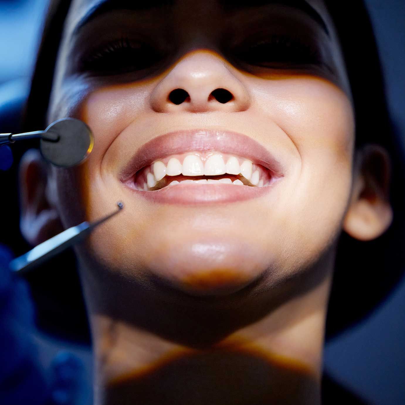 mile, teeth and tools with woman at dentist for oral hygiene or dental care appointment closeup.