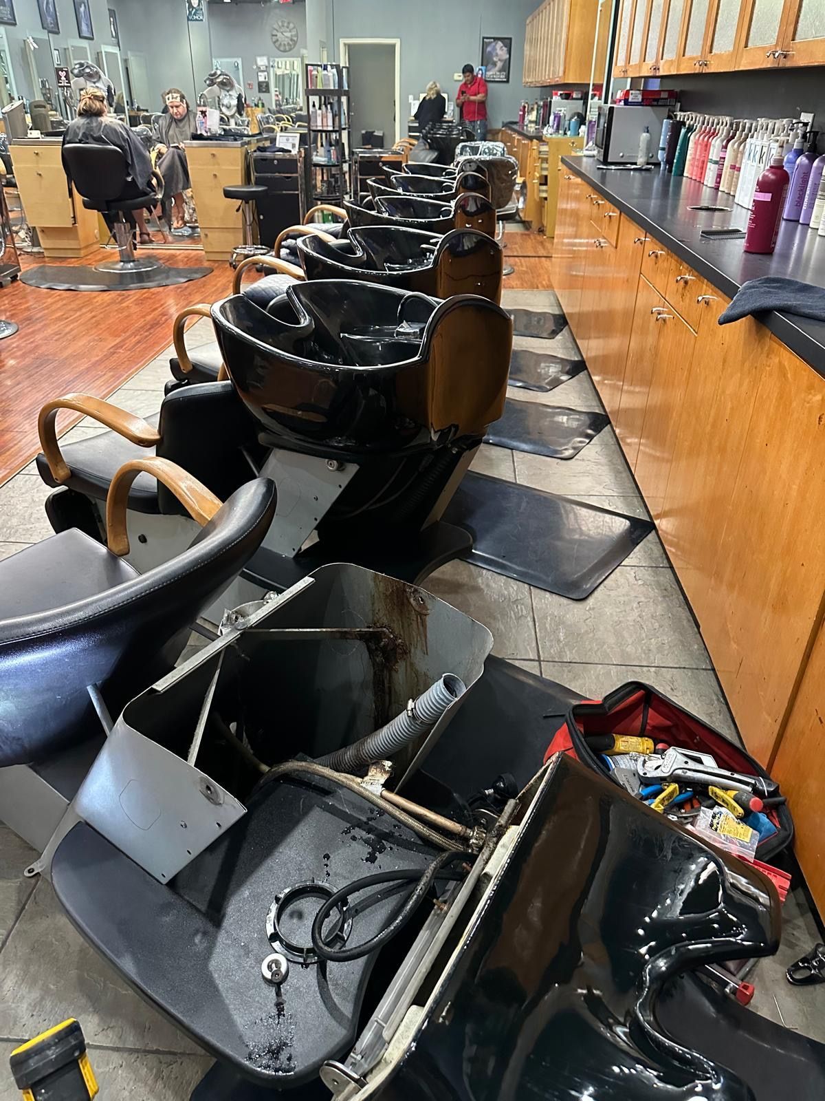 Picture of plumbing done in a building of a commercial hair dresser.