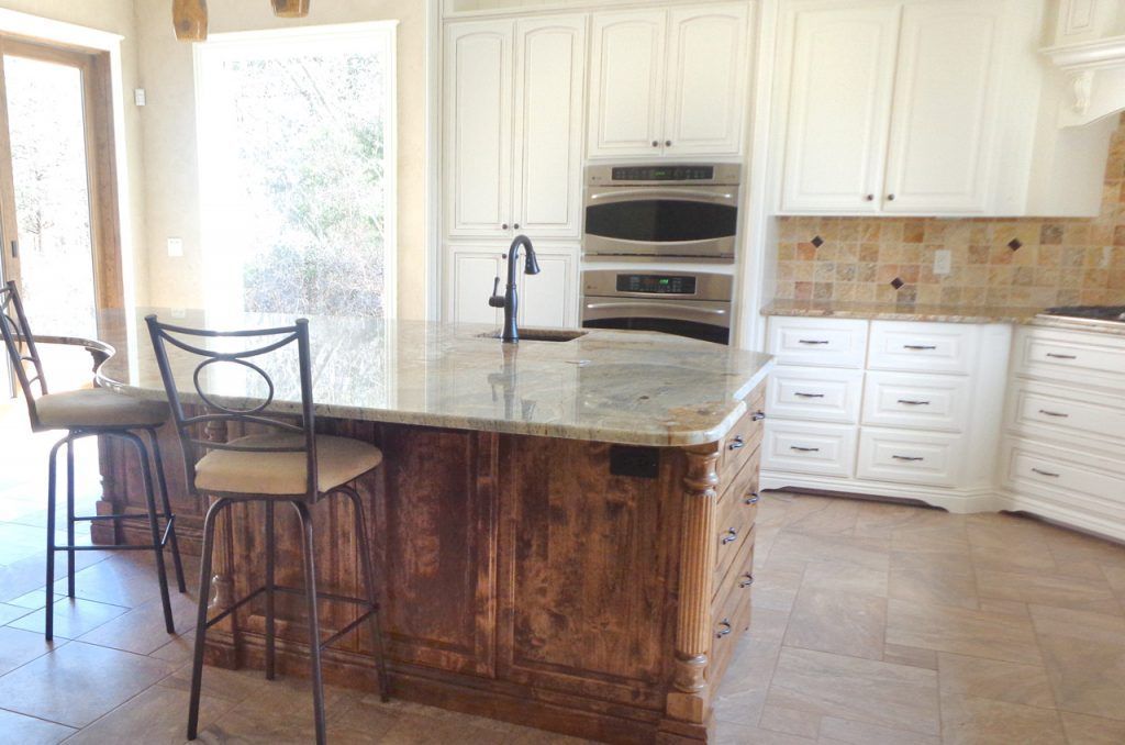 Kitchen With A Sink And A Picture Above It — Willard, MO — Bill’s Custom Woodworks