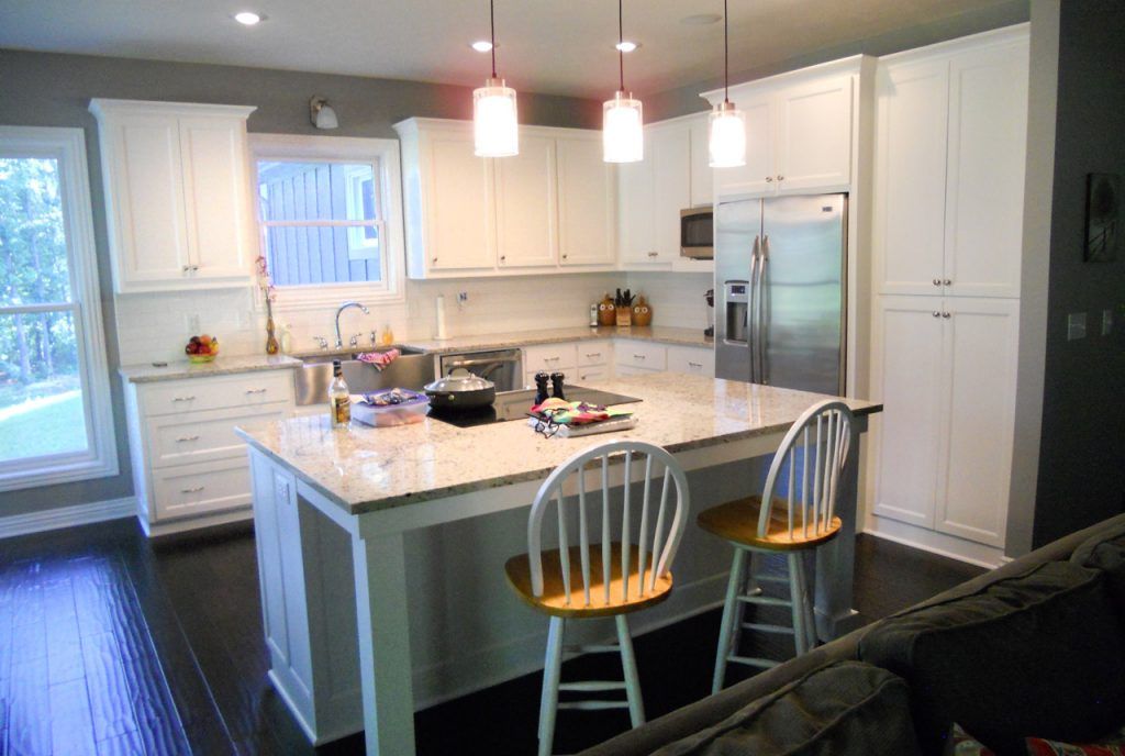 Kitchen With White Cabinets, Stainless Steel Appliances, And A Large Island — Willard, MO — Bill’s Custom Woodworks