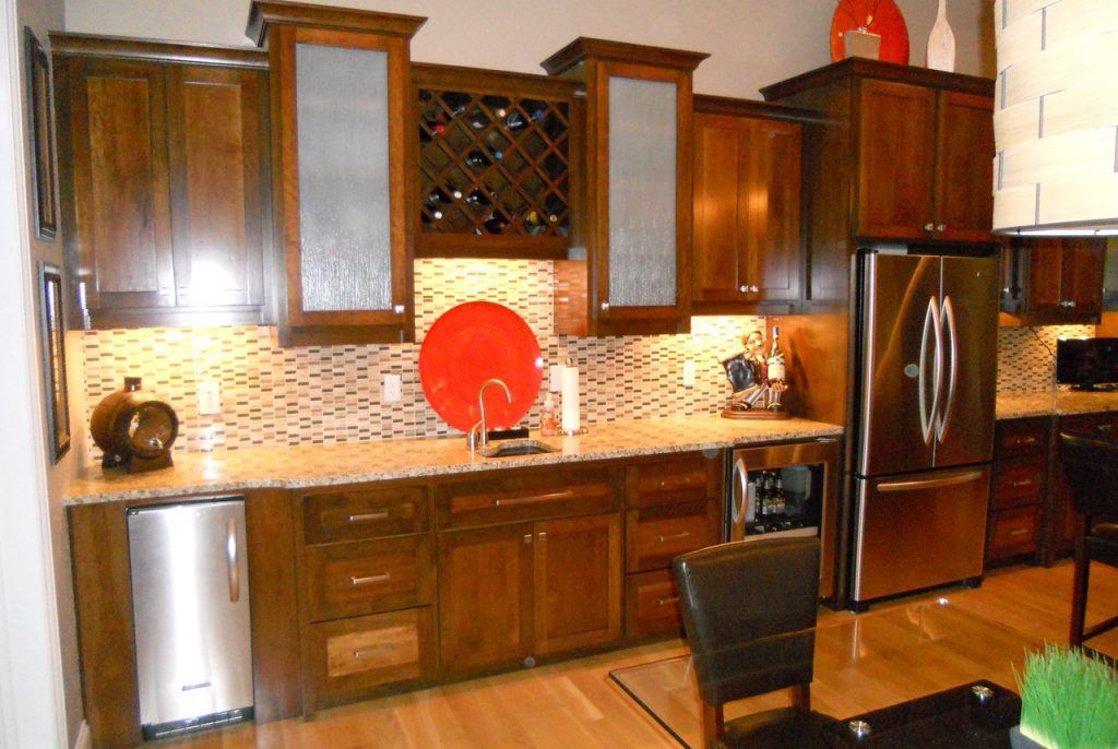Kitchen With Stainless Steel Appliances And Wooden Cabinets — Willard, MO — Bill’s Custom Woodworks
